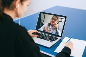 Diverse Group of People Engaged in a Video Call